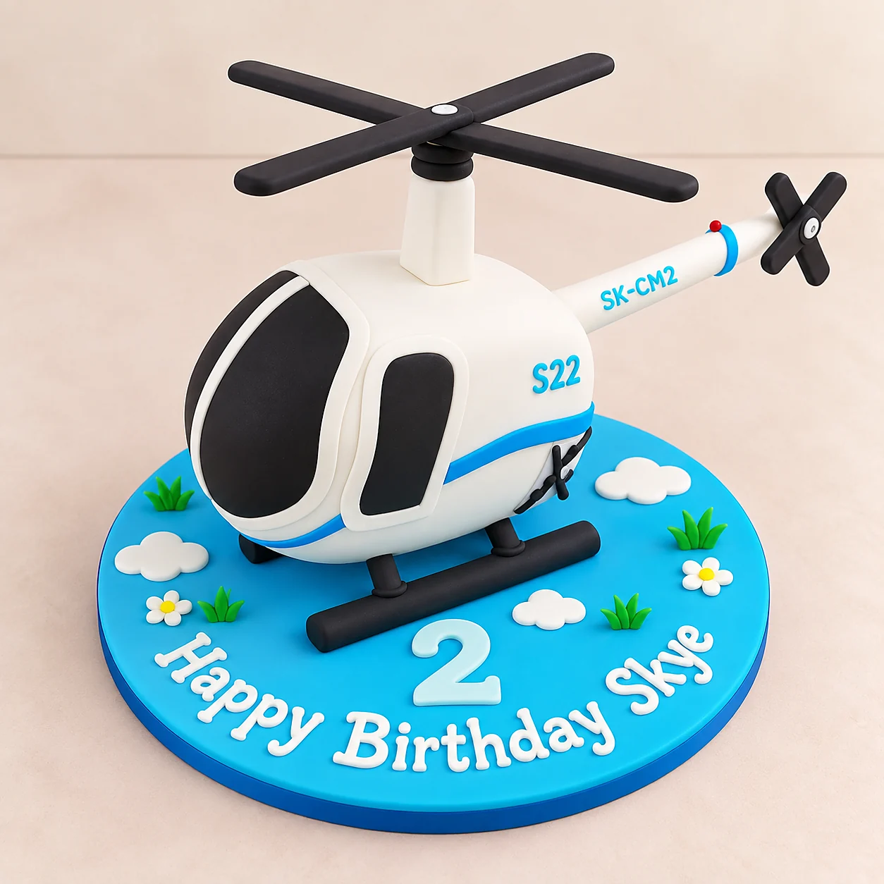 Sculpted helicopter themed children's birthday cake