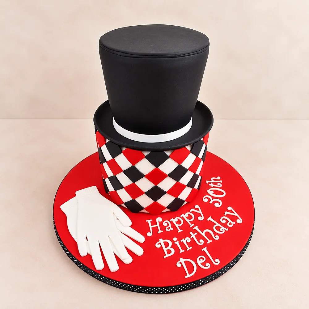 Black top hat and white gloves celebration cake