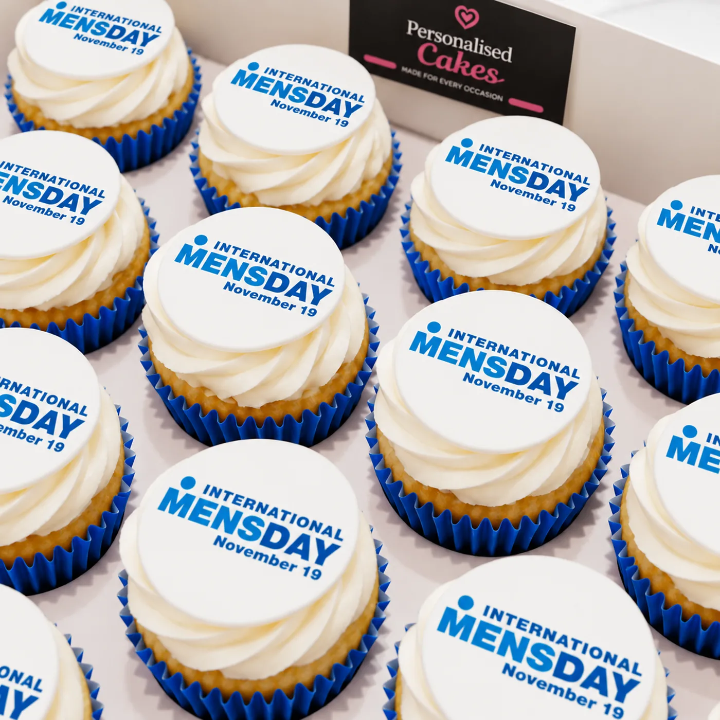 International Men’s Day blue and white branded cupcakes