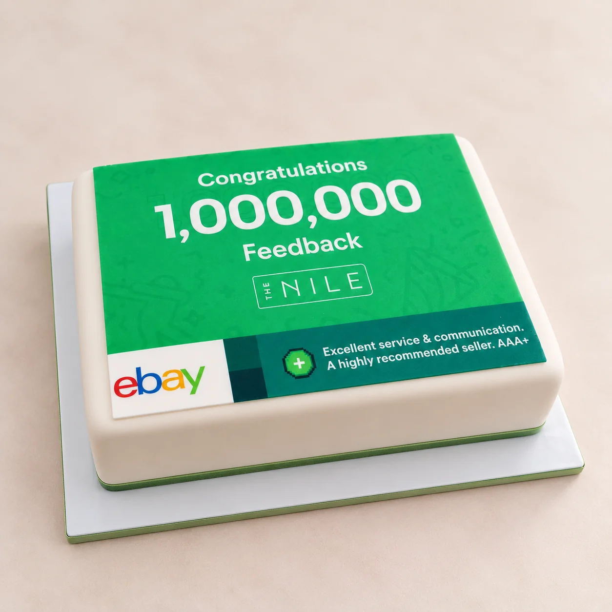 Green corporate eBay cake celebrating 1,000,000 pieces of customer feedback