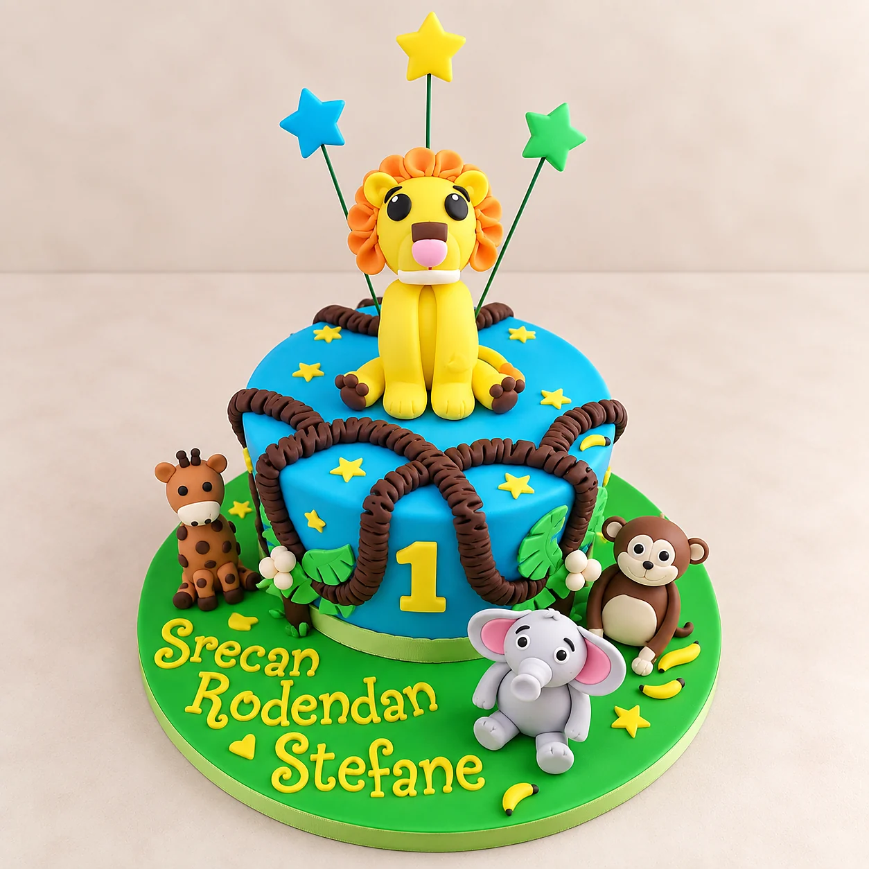Blue safari themed children's cake with animal figures and stars
